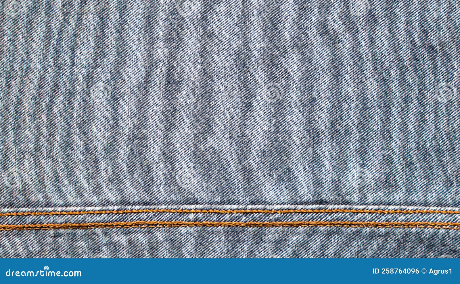 Texture of Blue Jeans Denim Fabric with Seam Background Stock Photo