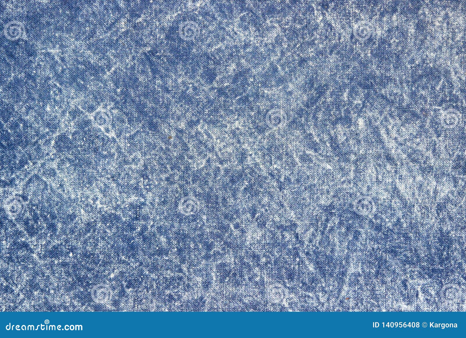 texture of a blue stone-washed denim fabric