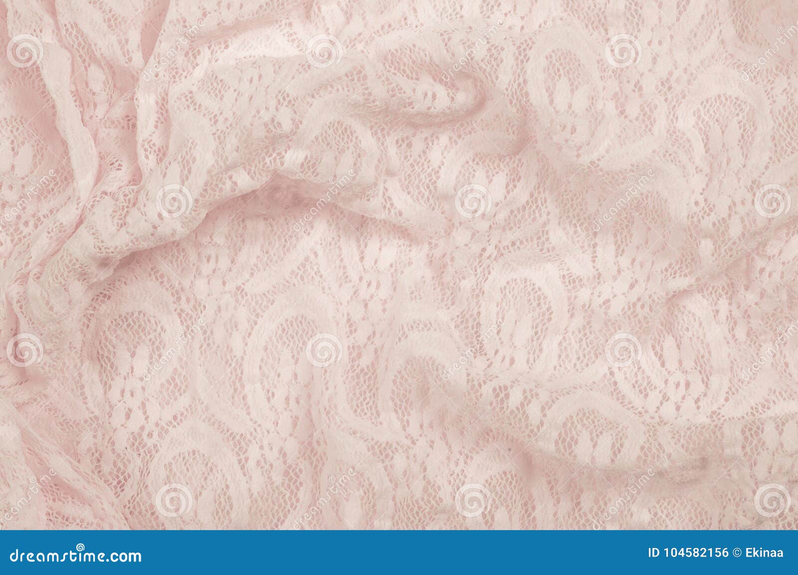 Texture, fabric, background. Lacy pink fabric, lace. A fine open fabric, typically one of cotton or silk, made by looping, twisting, or knitting in patterns and used especially for trimming garments.