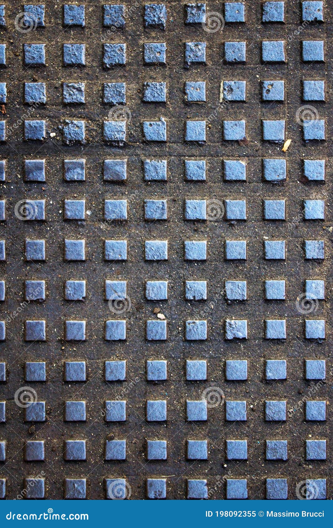 Texture of Metal Plate with Embossed Square Patterns Stock Image