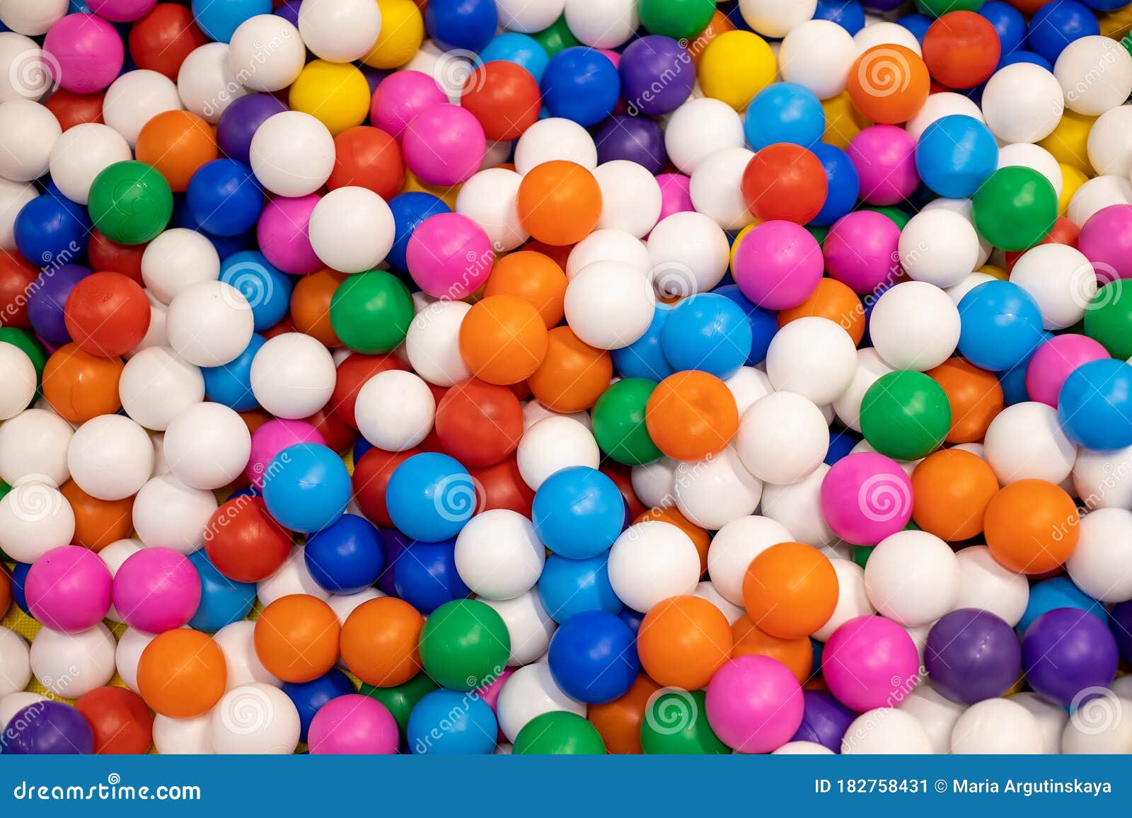 Texture of Multicolored Plastic Balls for the Background. for Children