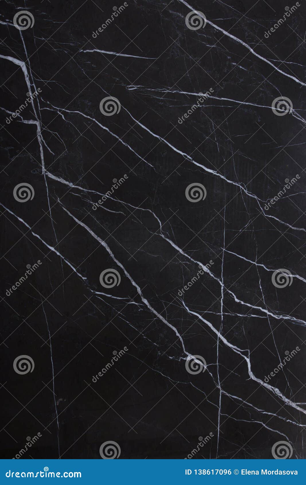 the texture of natural stone is black marble with patterns and white stripes, the stone is called nero marquina