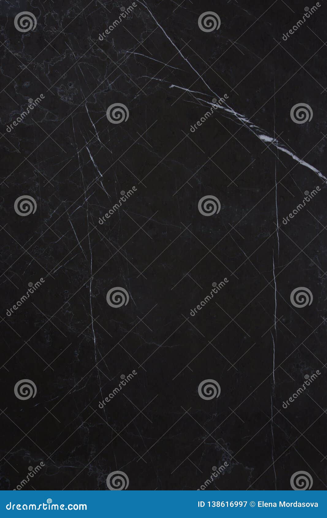 the texture of the natural stone is dark marble with patterns and white stripes, the stone is called nero marquina