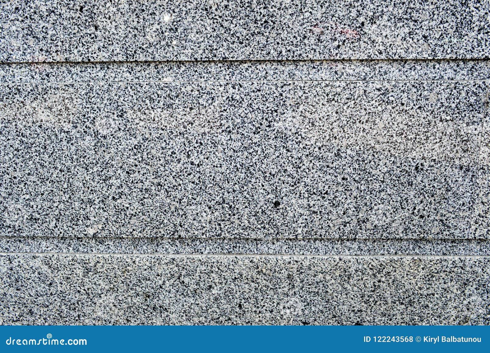 The Texture of the Stone Wall is Solid Smooth of Granite Crumbs of Two