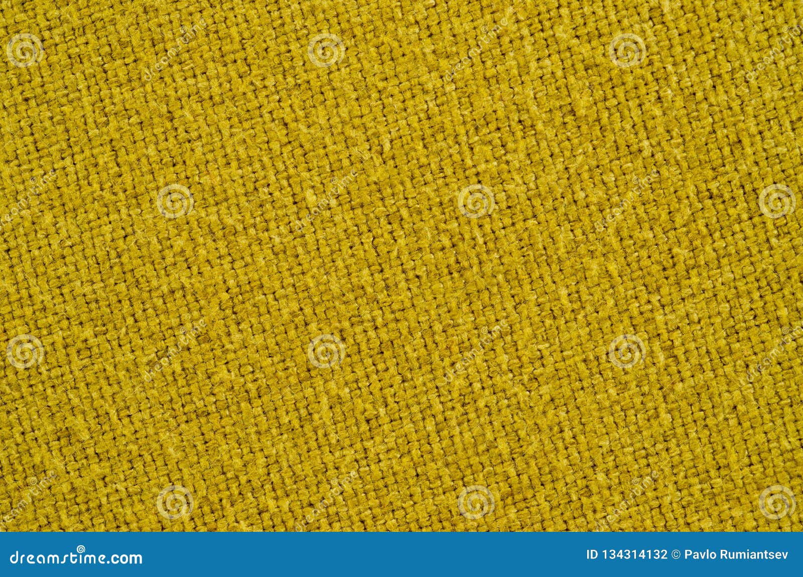 Texture of Thick, Strong Mustard Color Fabric Shot Closeup Stock Photo