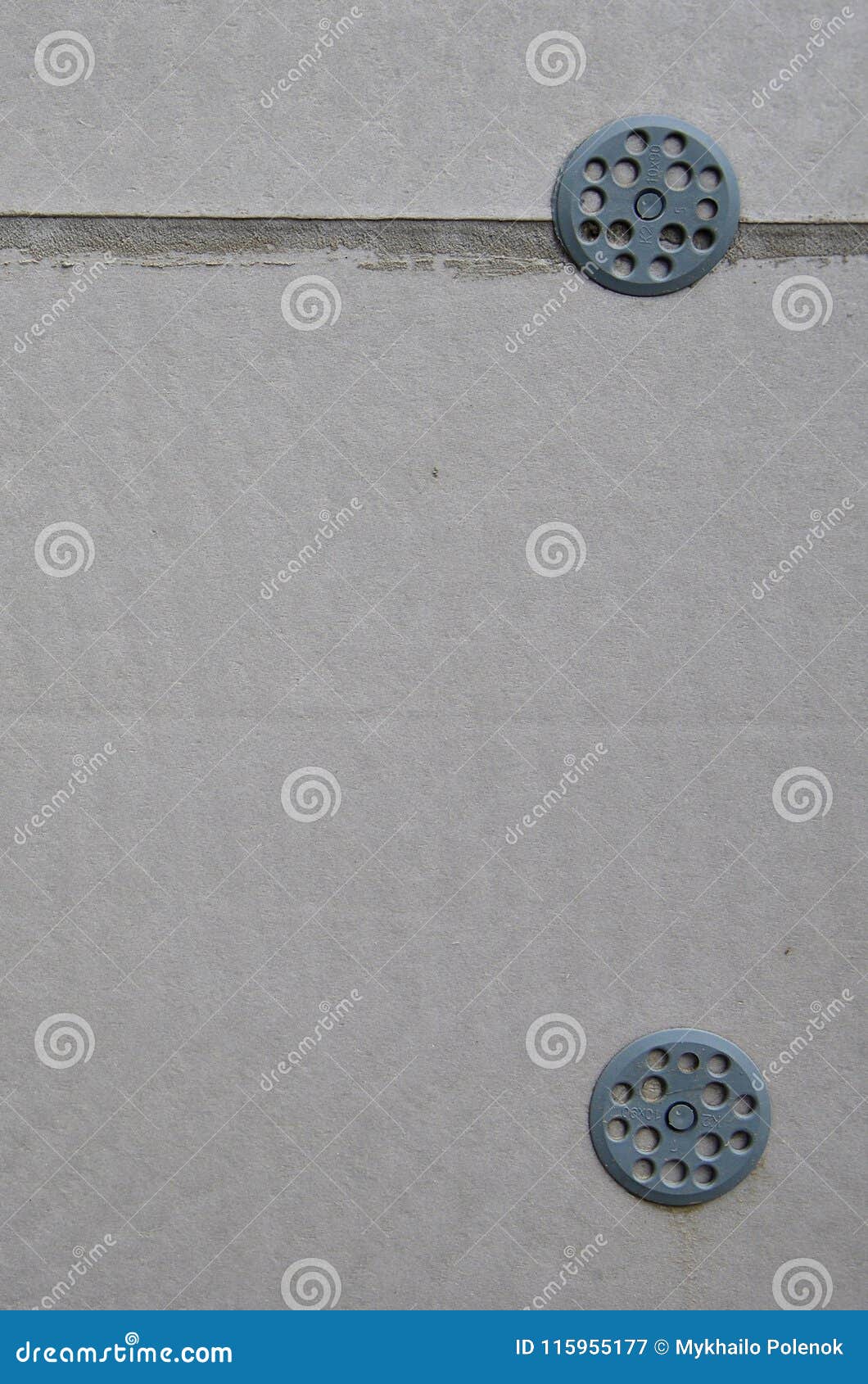 the texture of the wall, covered with gray foam polystyrene plates, which are reinforced with plastic umbrella dowels. stage of w