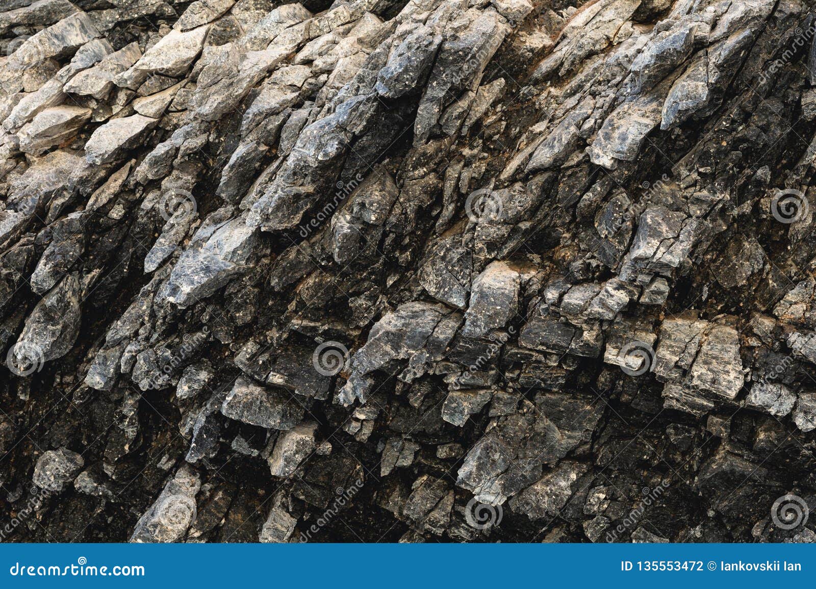 Textured Basalt Background Thin Stone Fibers in the Cut. Natural