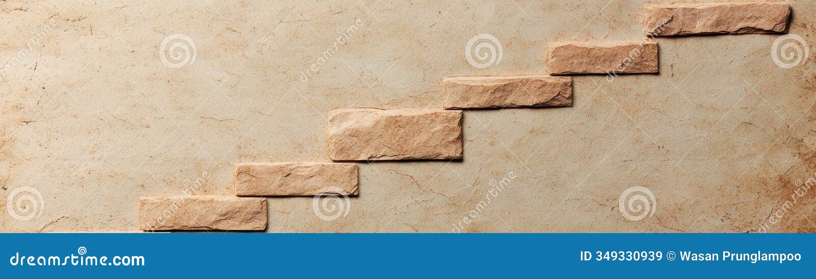 a textured stone wall with a gradual stairlike pattern creating a unique architectural 
