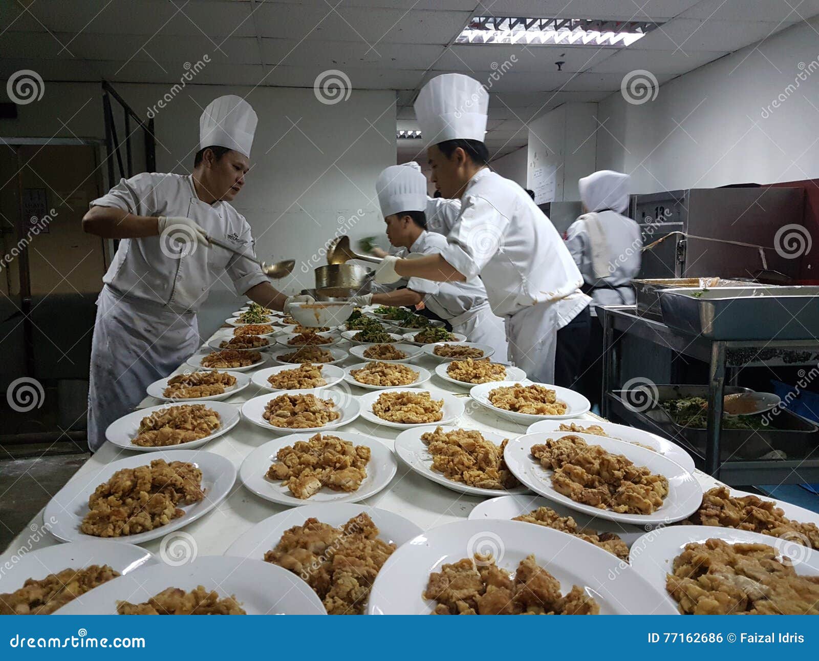 11th Sept 2016.Kitchen Crew Busy Preparing Banquet Dinner Function
