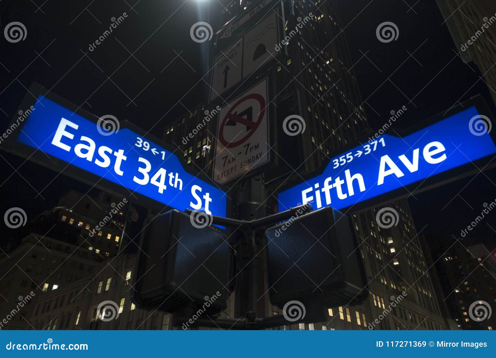 Manhattan Lighted Street Signs Blue and White Stock Image - Image of ...