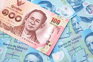A Thai Baht Note With Mexican Twenty Peso Bank Notes Stock Image 