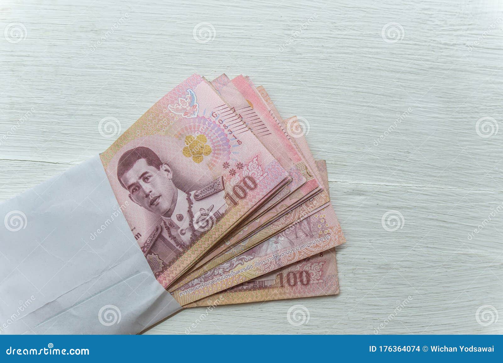 Thai Banknote 100 Baht in a White Envelope on a White Table, Concept of  Thai Banknotes, Baht Currency Stock Photo - Image of bank, bill: 176364074