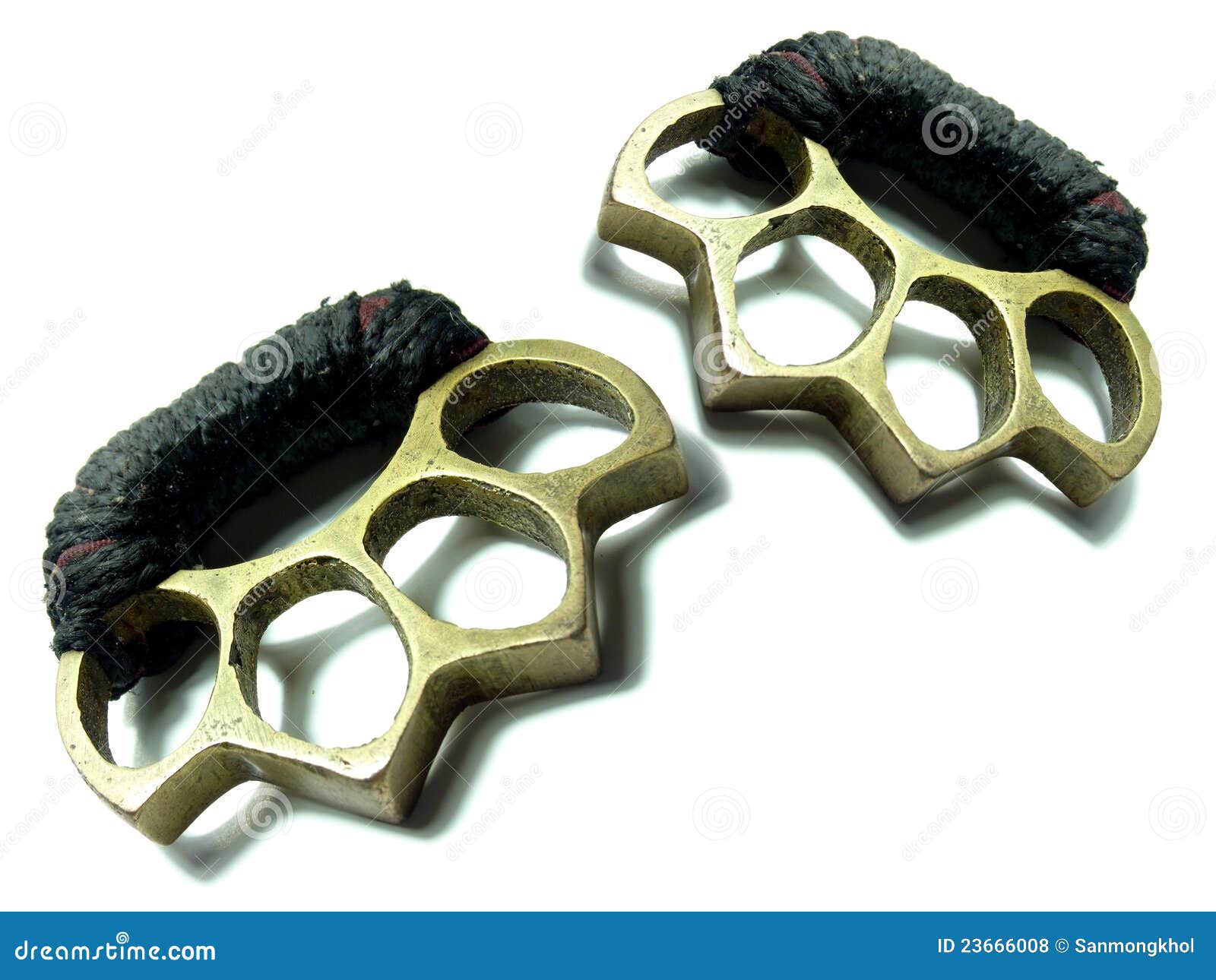 Thai Brass Knuckle-duster on White. Stock Photo - Image of