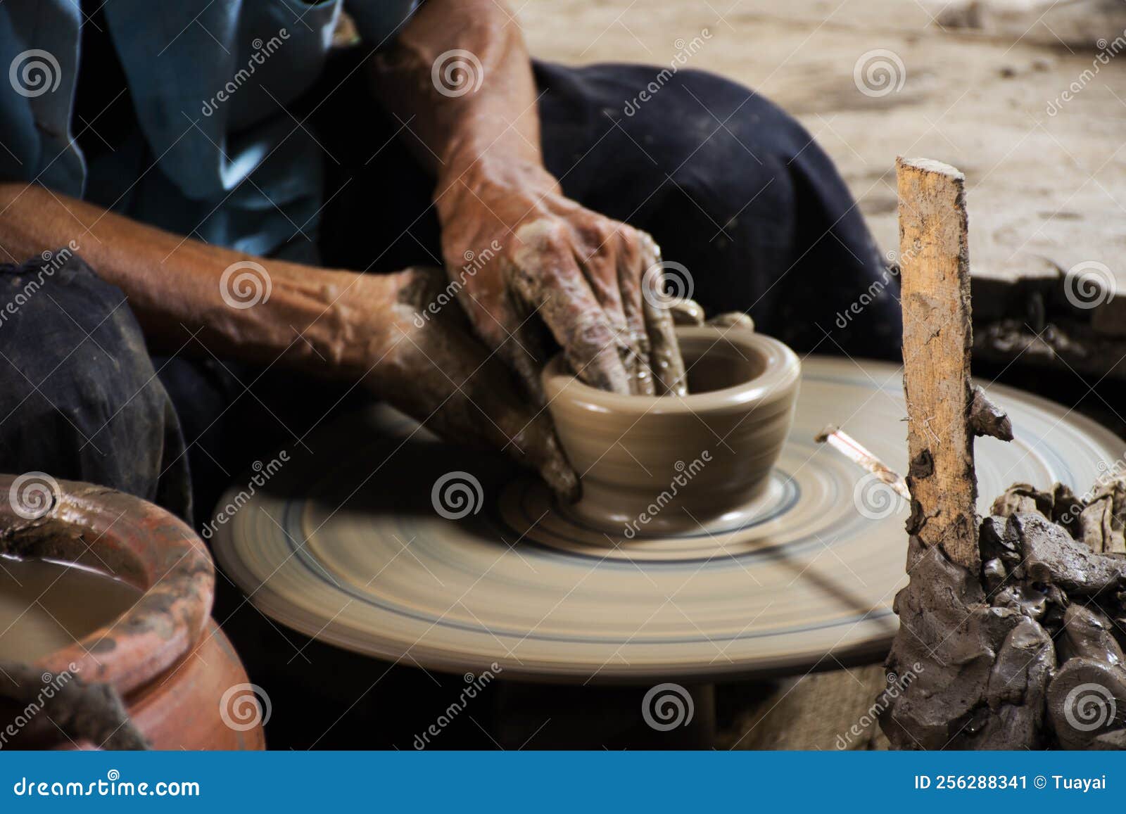 Thai Craftsmanship Technician or Professional Potter Use Machine
