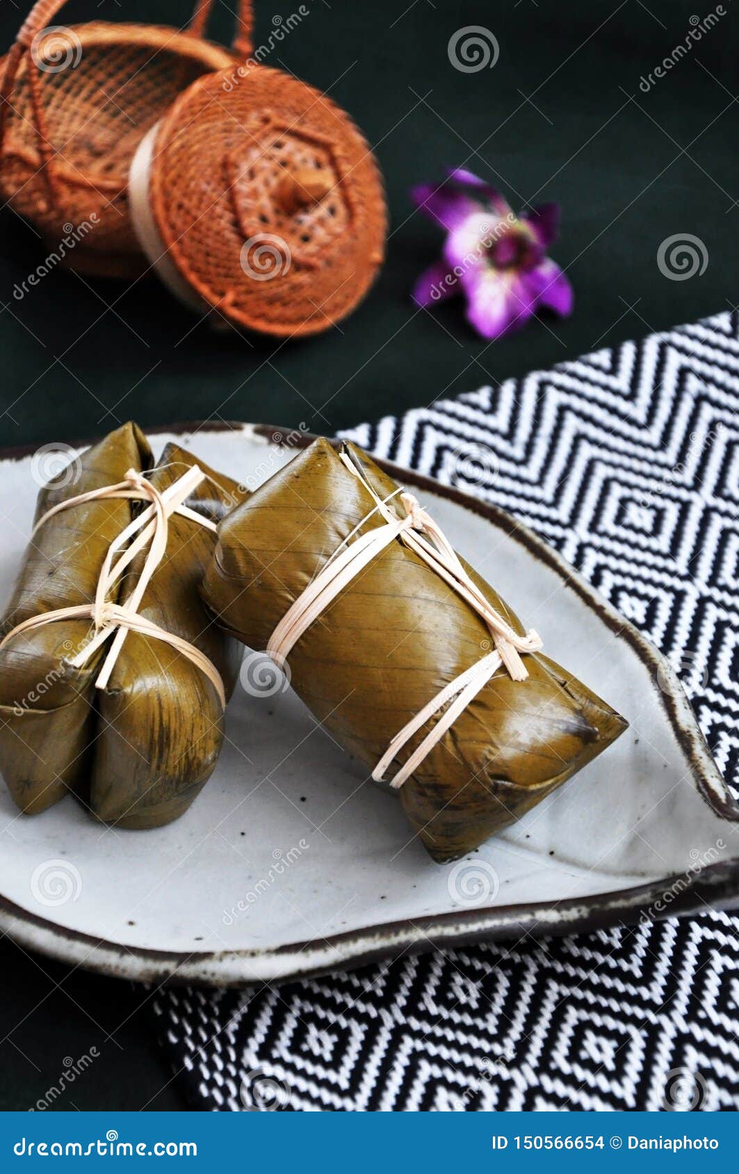 Thai Dessert Sticky Rice with Banana Filling on Plate Stock Photo ...