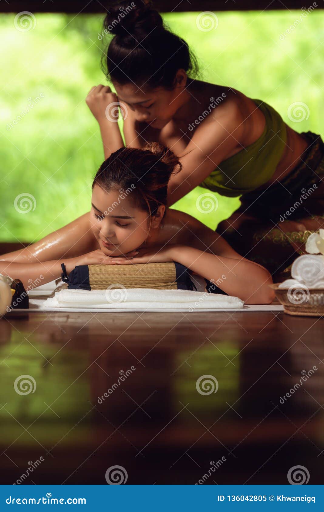Thai Girls Therapist Body Spa Massage and Lying Relaxation in Business Massaging and Salon Shop., Pretty Attractive Asian Woman is Stock Image photo pic