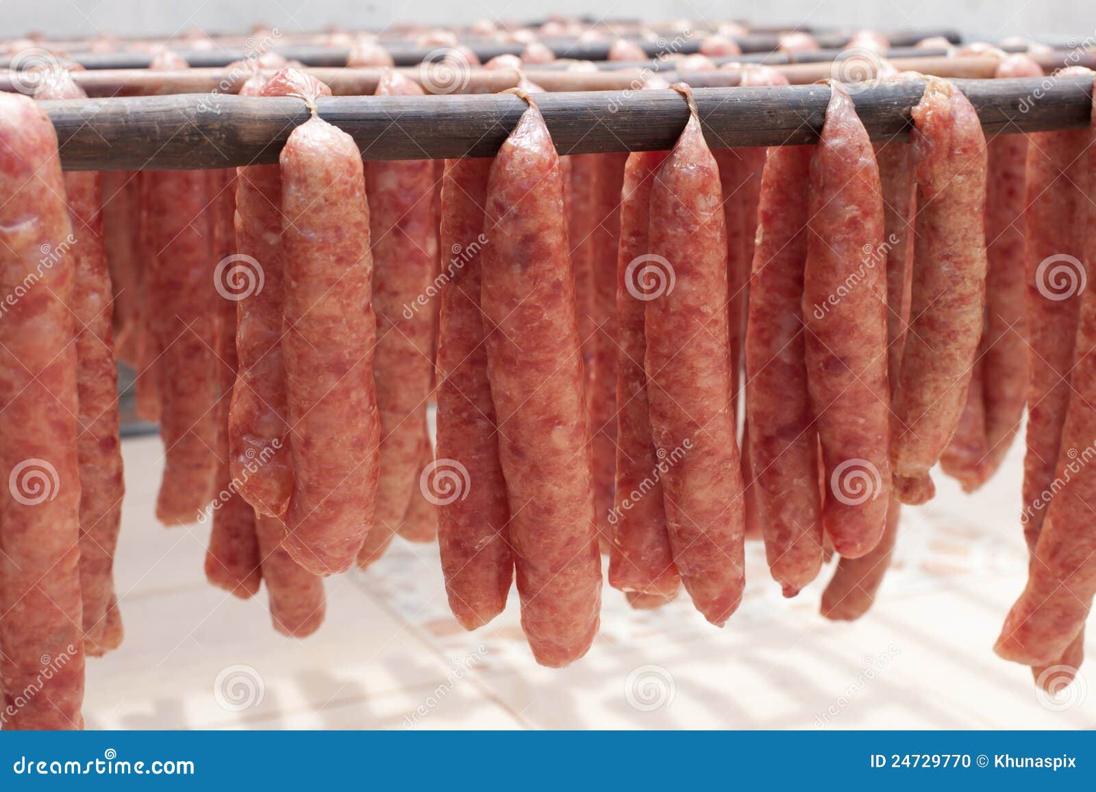 Thai Local Pork Sausage Style Drying on the Bamboo Stock Photo Image