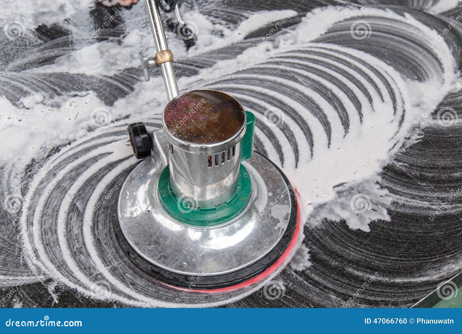 thai people cleaning black granite floor with machine and chemical