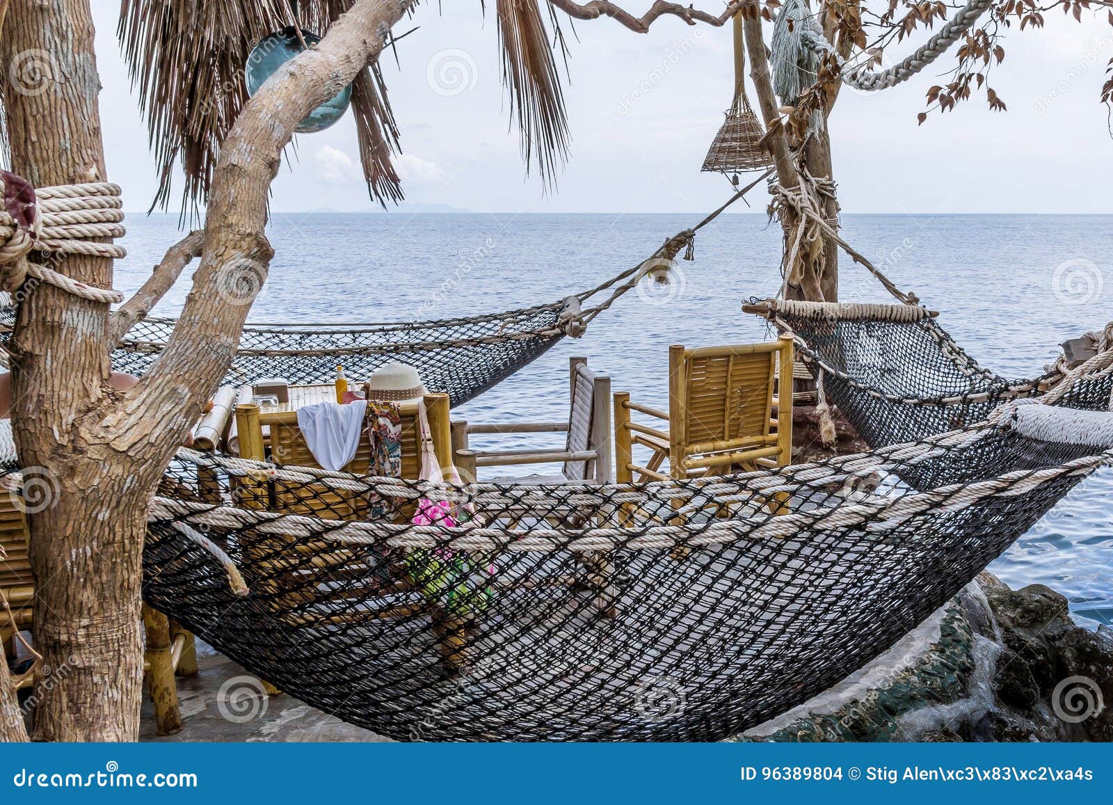 Thai Restaurant with Hammocks on a Cliff Over the Ocean Editorial Stock