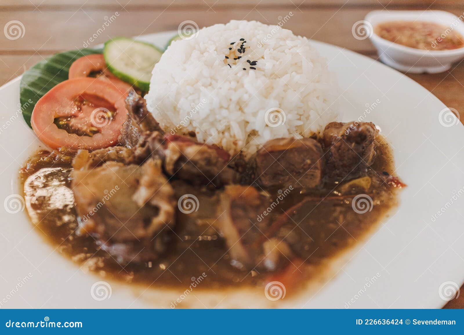 Thai Stewed Beef with Rice Served on White Dish. Stock Photo Image of