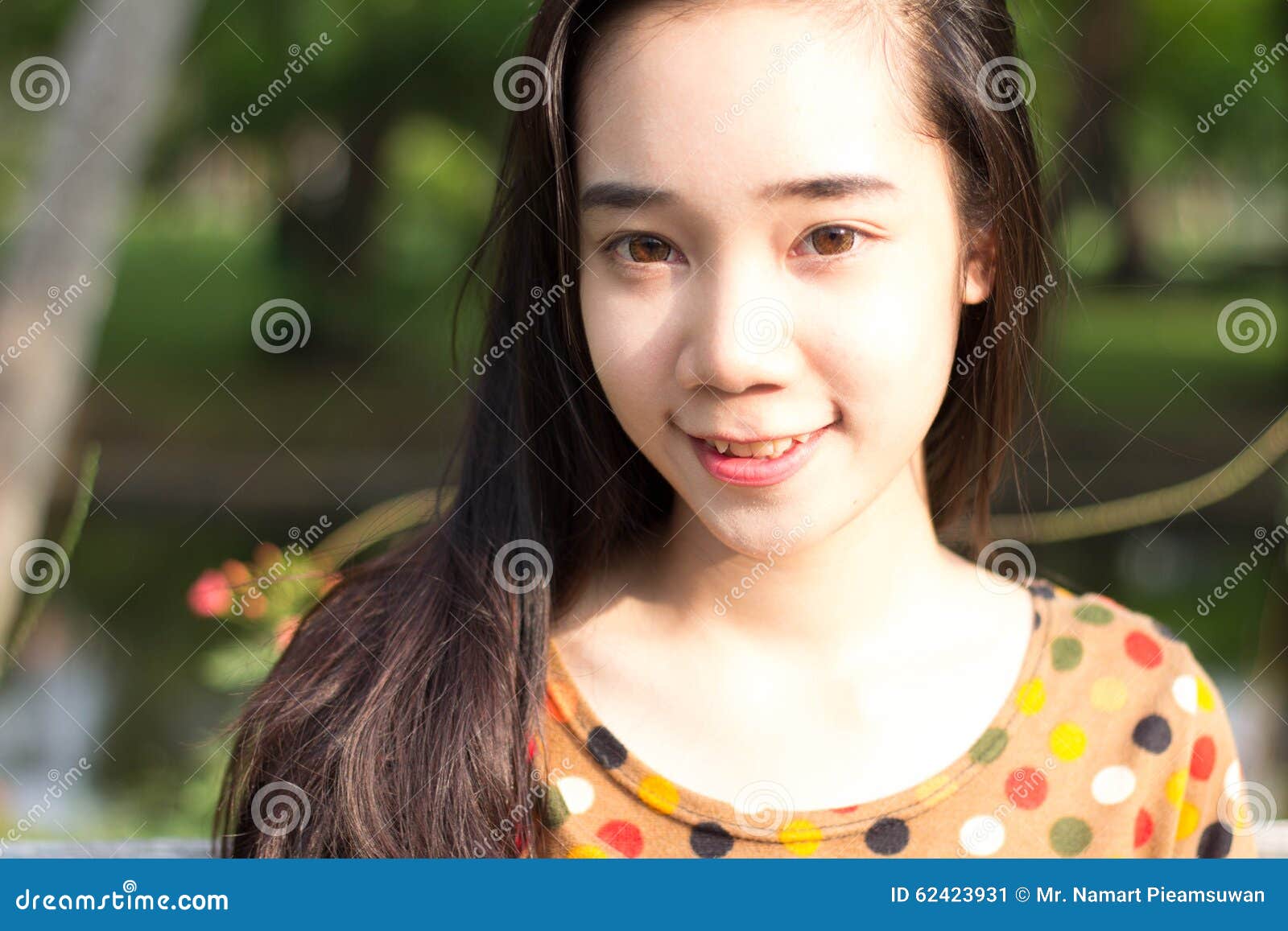 Thai Student Teen Beautiful Girl Relax And Smile In Park