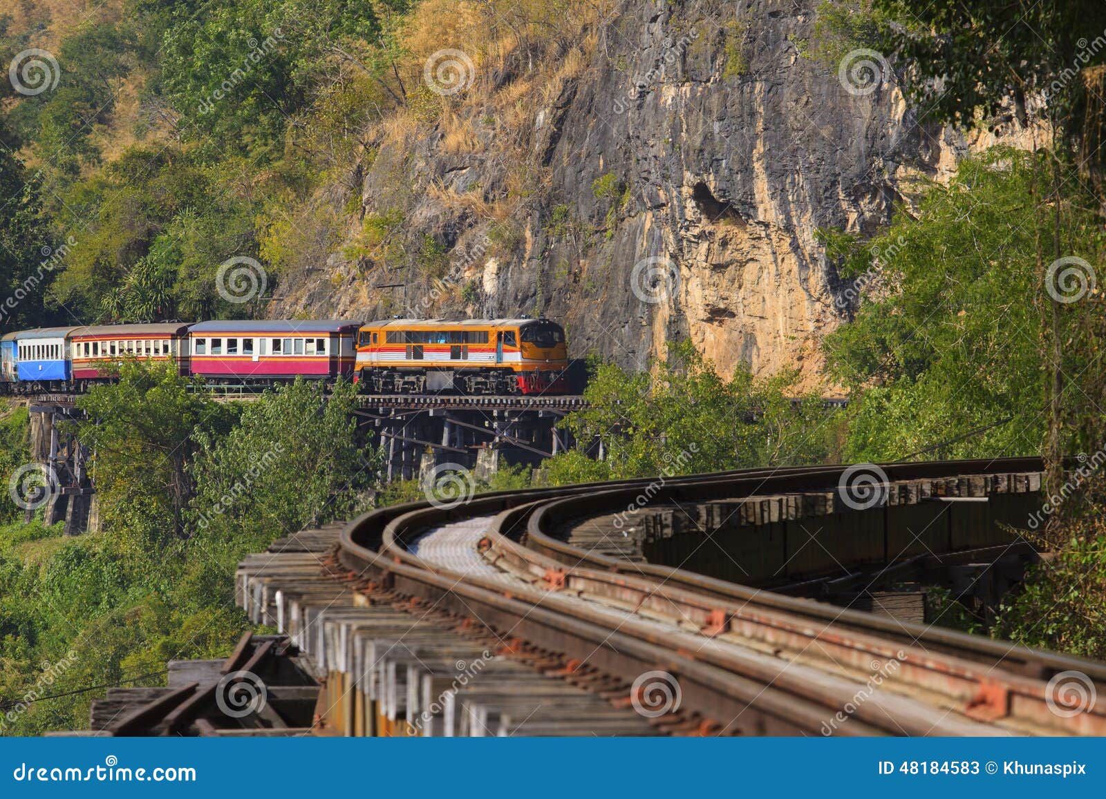 thai trains running on death railways crossing kwai river in kan