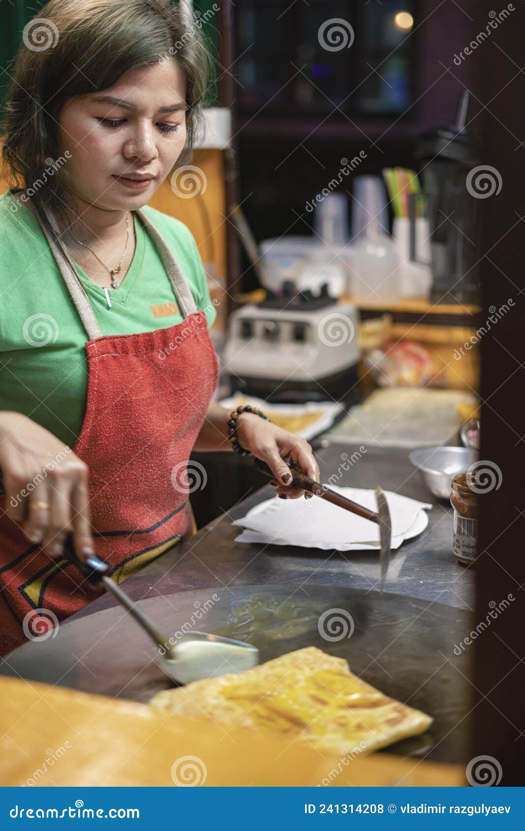 Thailand, Phuket July 5, 2019: Thai Chef Cooks Thai Fast Food Pancakes