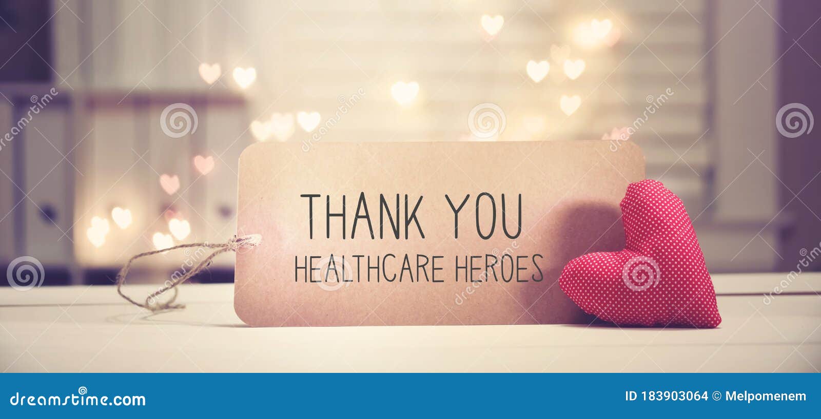 thank you healthcare heroes message with a red heart