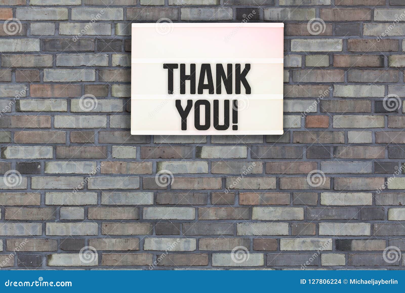 Thank You Message on Brick Wall with Light Box Stock Photo Image of