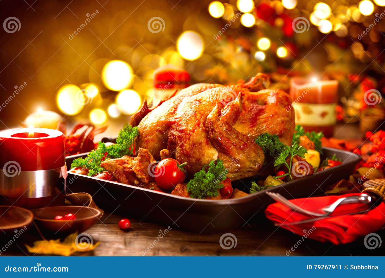 thanksgiving table served with turkey, decorated with autumn leaves