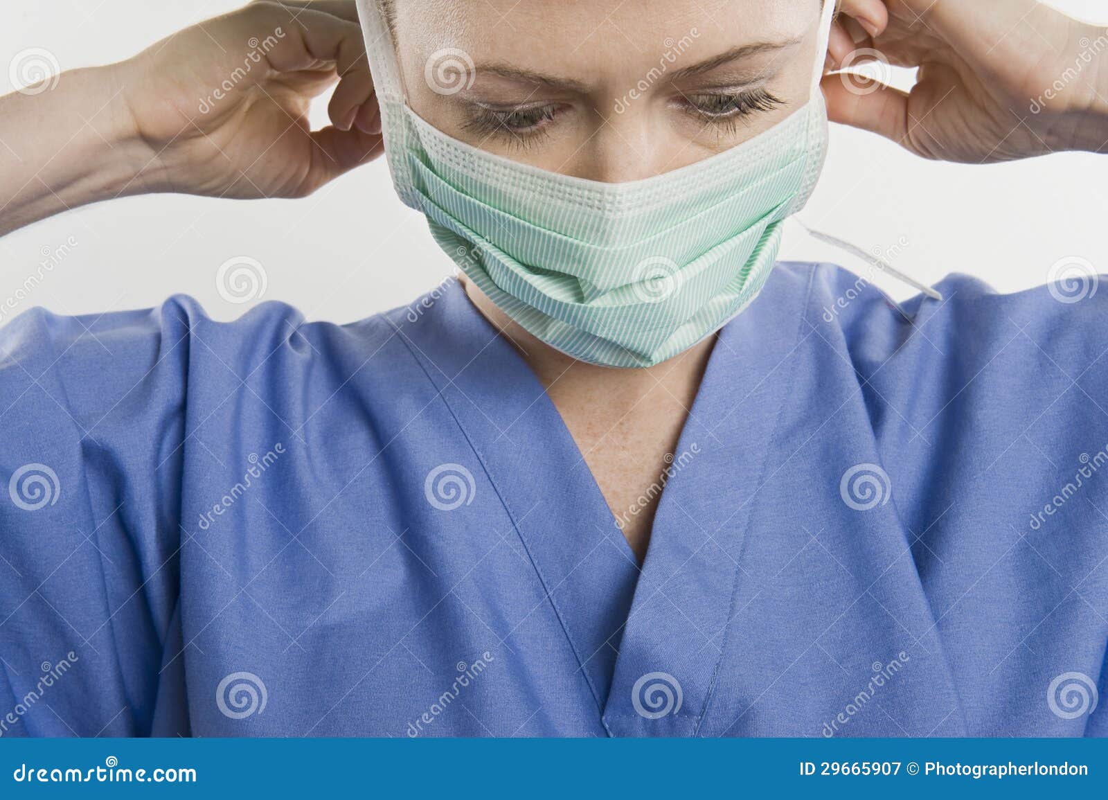 Theatre Nurse Adjusting Mask Stock Image Image of caucasian, female