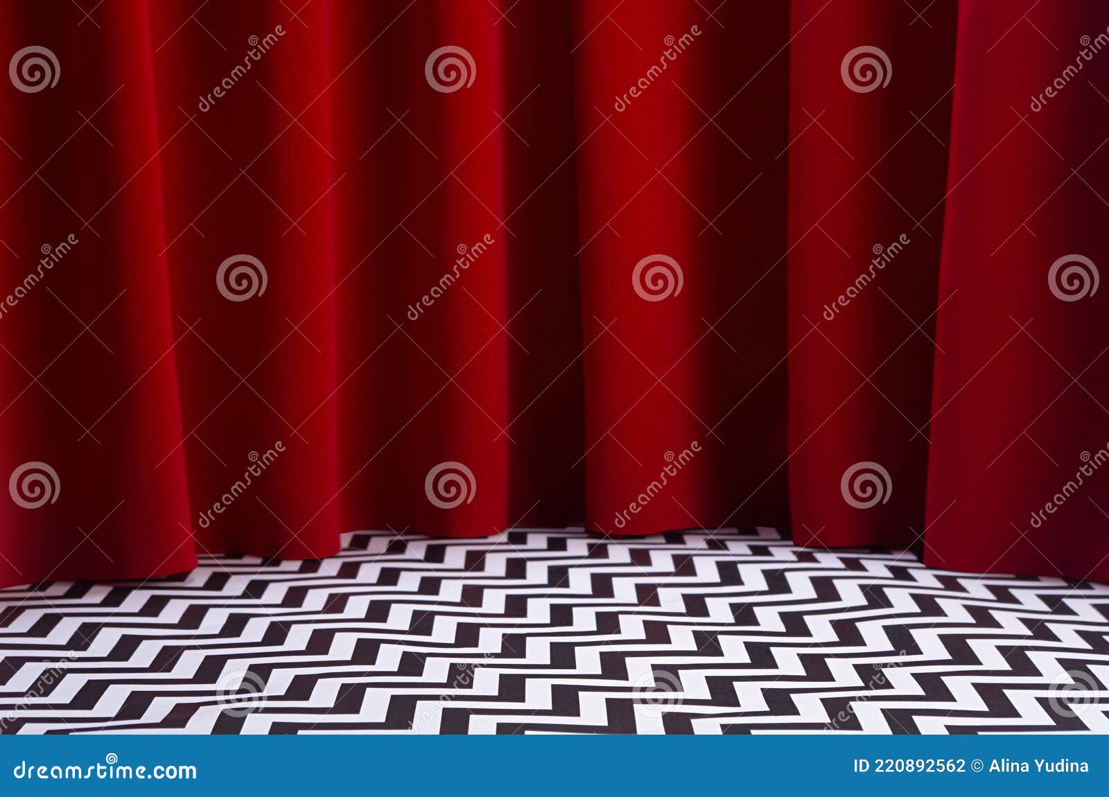 theatre scene with red velvet curtain and black and white tile on floor. stage for displaying product in twin peaks style.