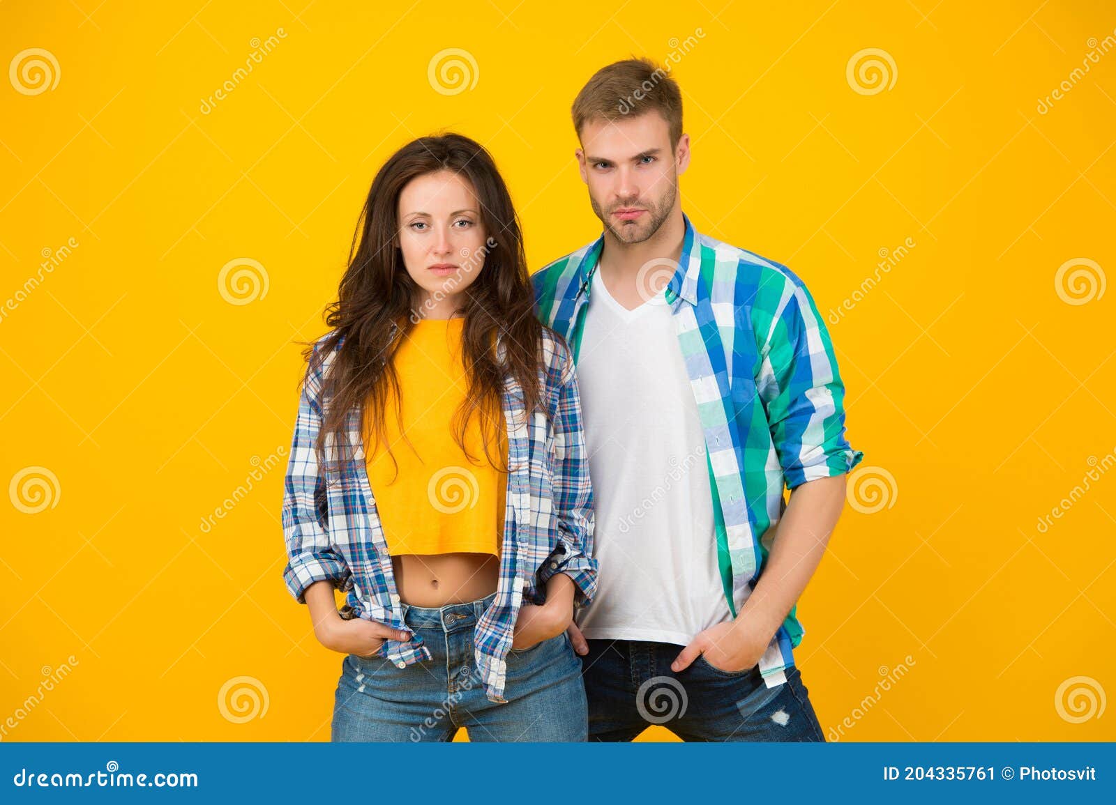 Their Style is a Lot More Casual. Couple in Casual Wear. Vogue Models  Yellow Background. Fashion Clothes Stock Image - Image of model, casual:  204335761