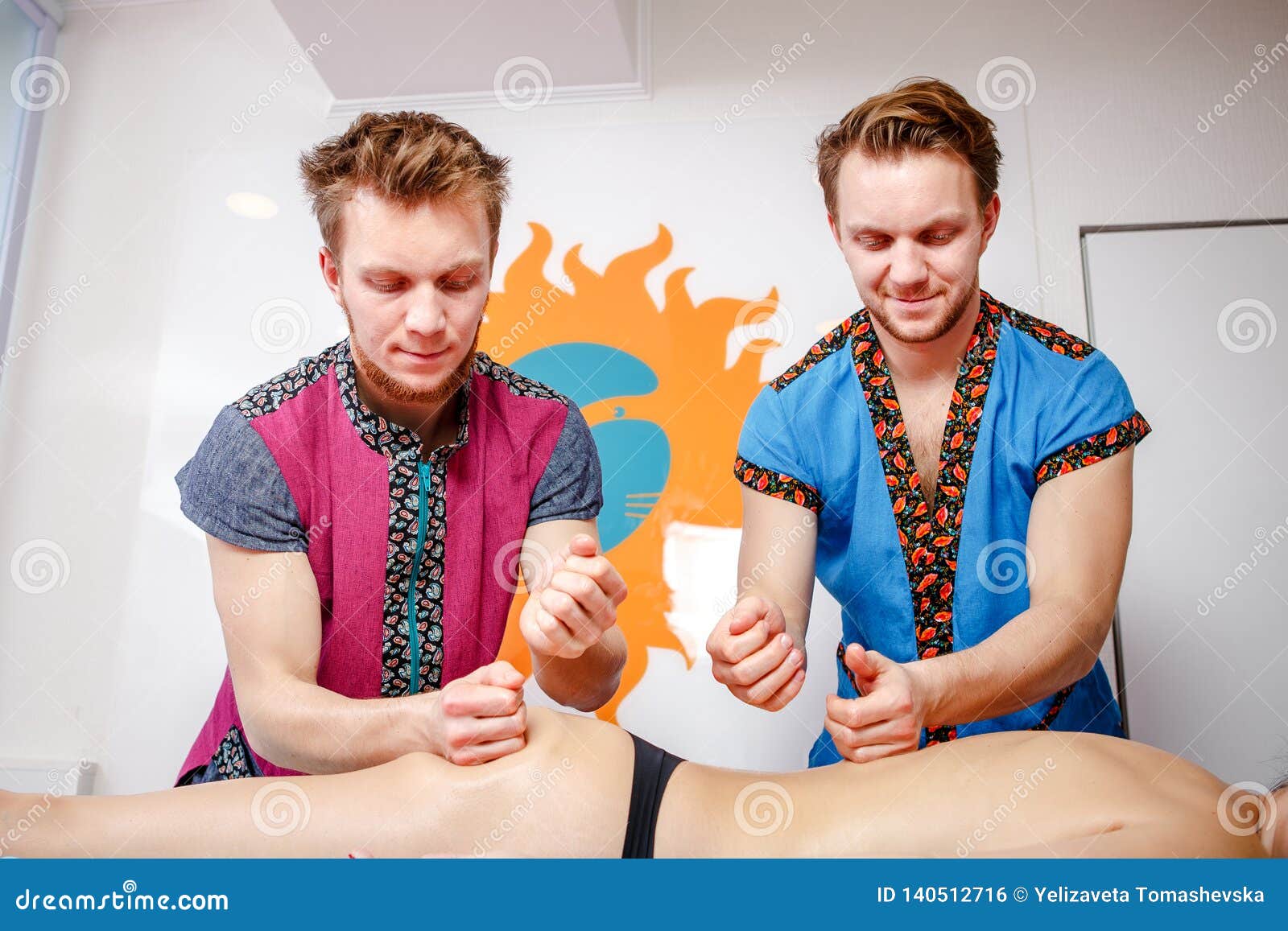 Theme Medicine and Rehabilitation. Two Twin Brothers Young Male Doctor