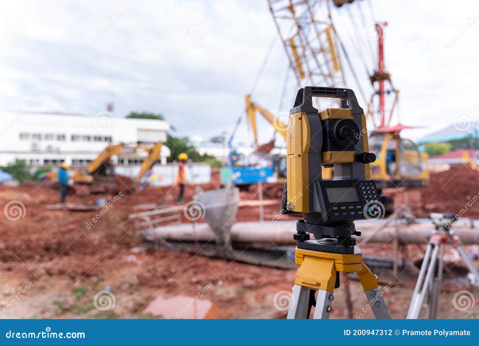 theodolite equipment  of surveyor builder engineer during surveying work in construction site