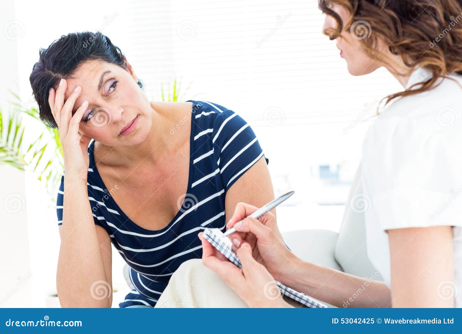 Therapist Listening Her Patient And Taking Notes Stock Image Image Of Psychologist Health