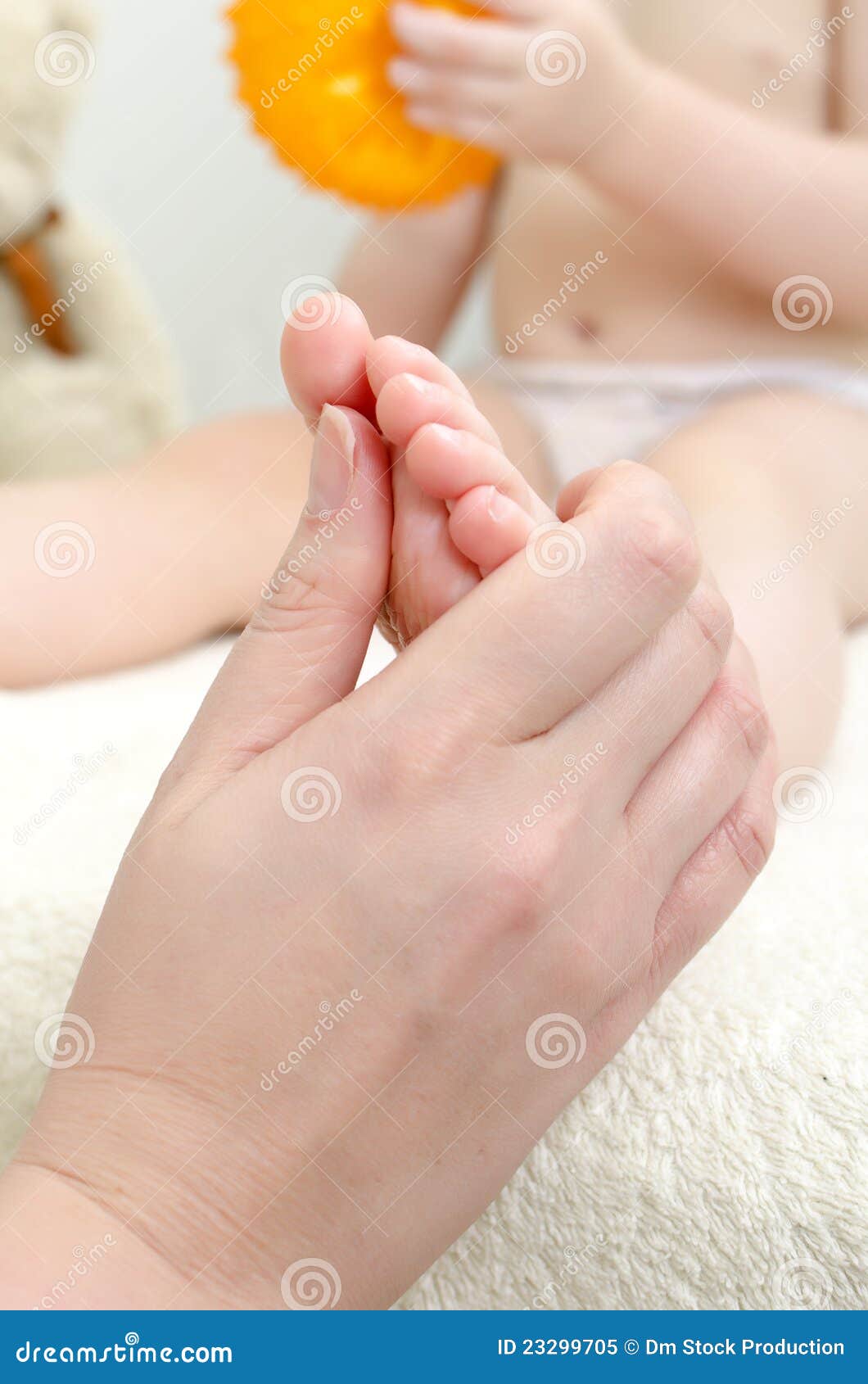 Therapist Makes a Child Massage. Stock Image Image of hand, assistance 23299705