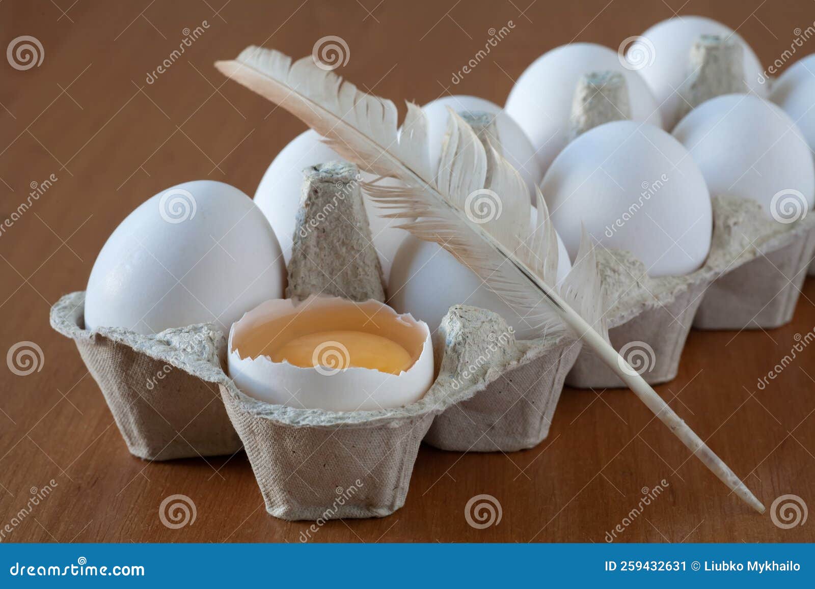 There are Eggs on the Table in a Tray. One Egg is Broken Stock Image ...
