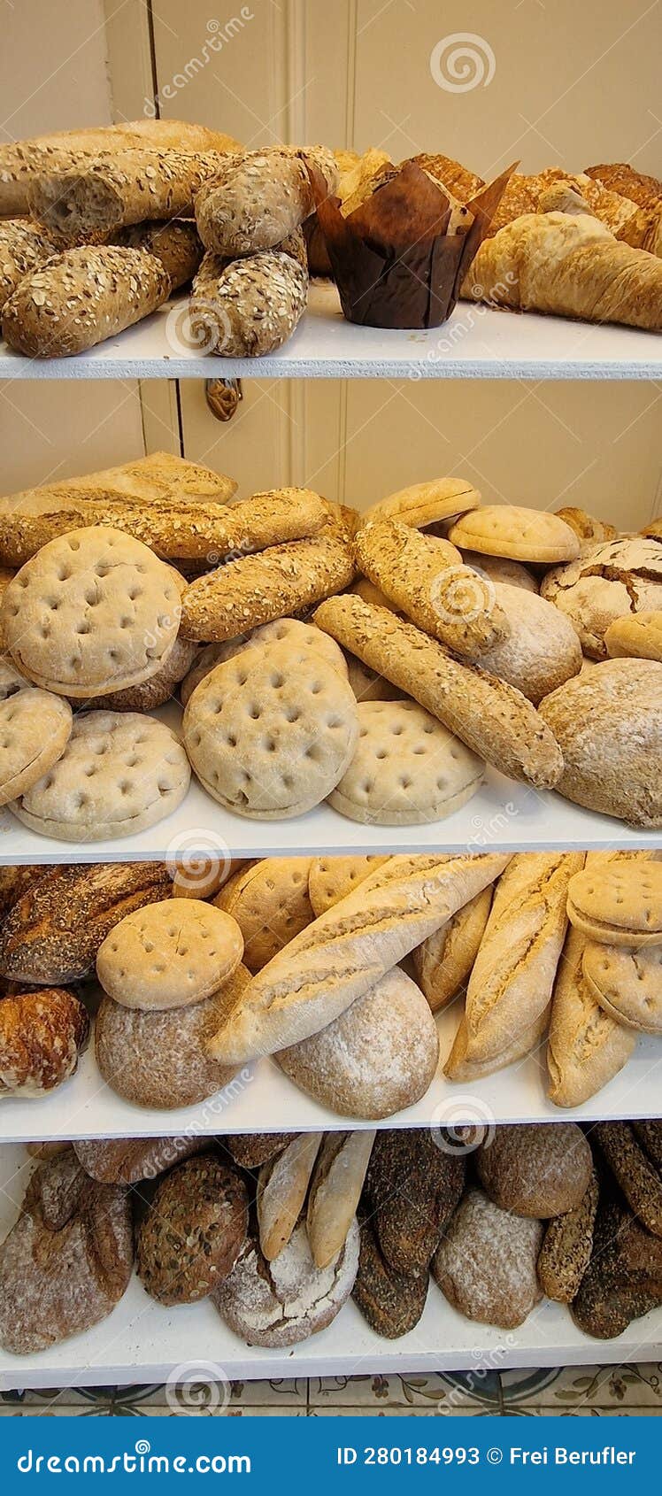 There are Four Different Types of Bread in Different Sizes on Four