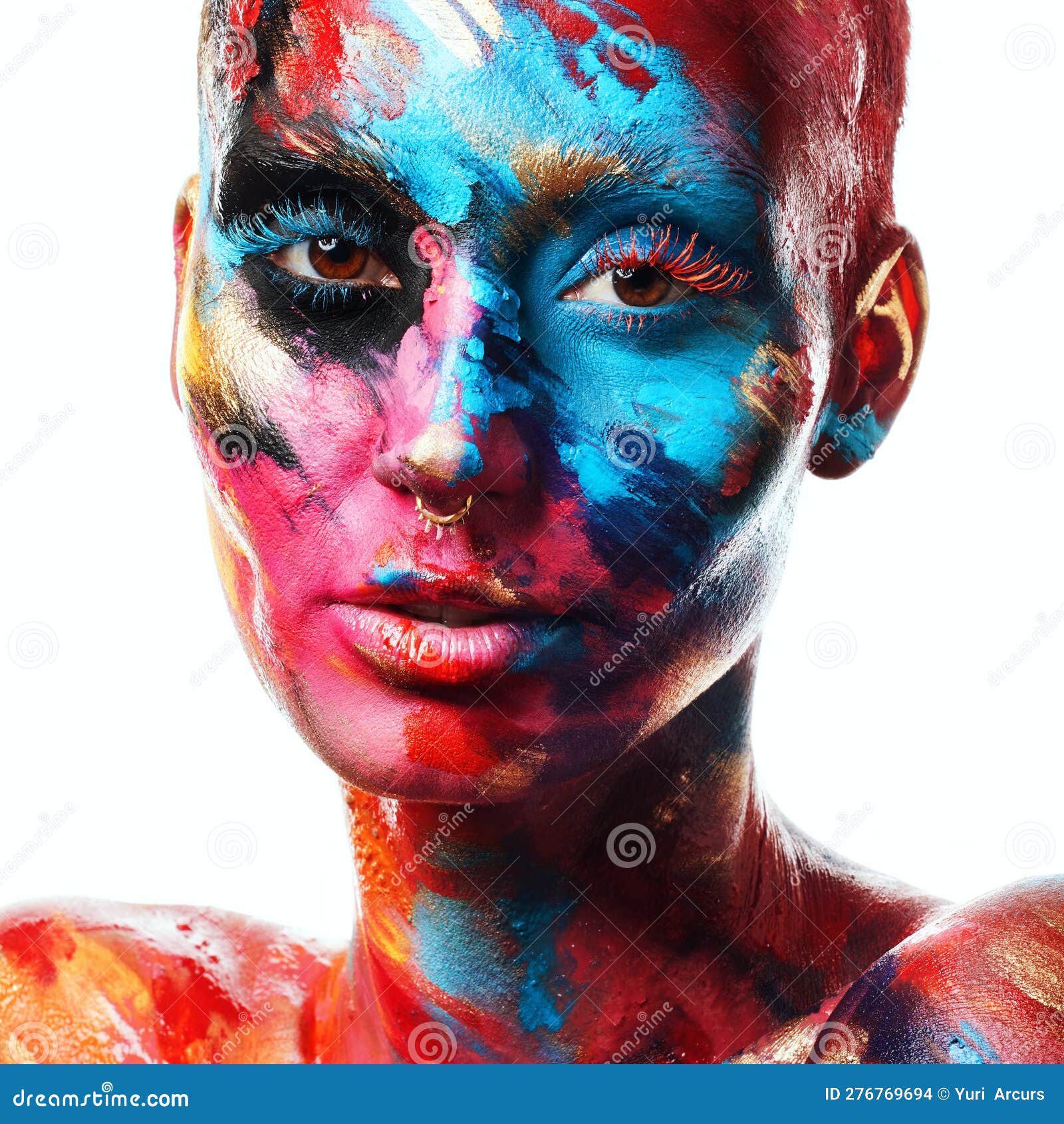 There is Magic in Creativity. an Attractive Young Woman Posing Alone in the Studio with Paint on
