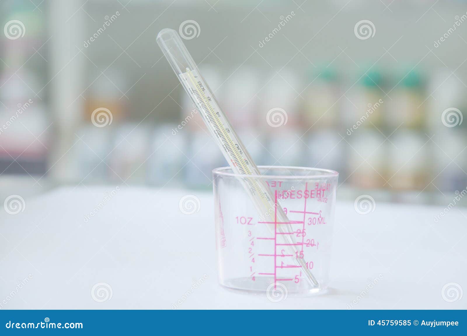 Thermometer in Beaker with Store Background Stock Image Image of