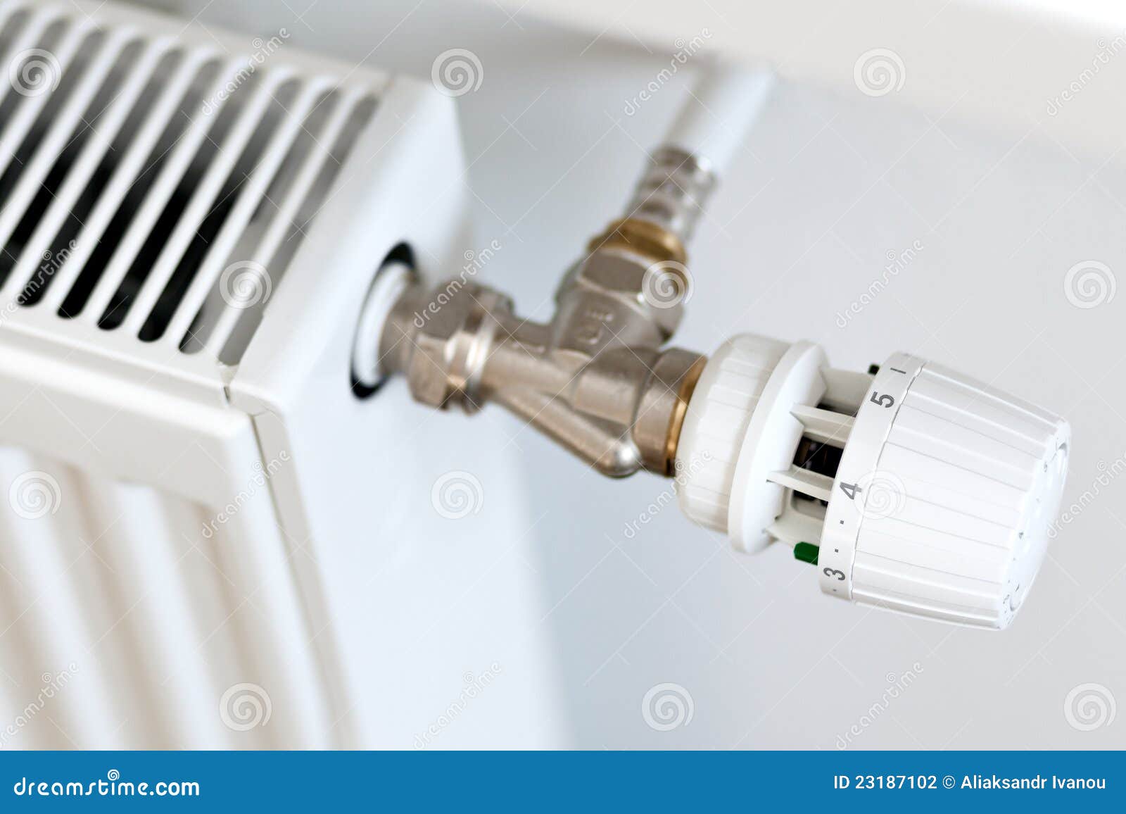 Thermostat on a radiator stock photo. Image of seasons 23187102