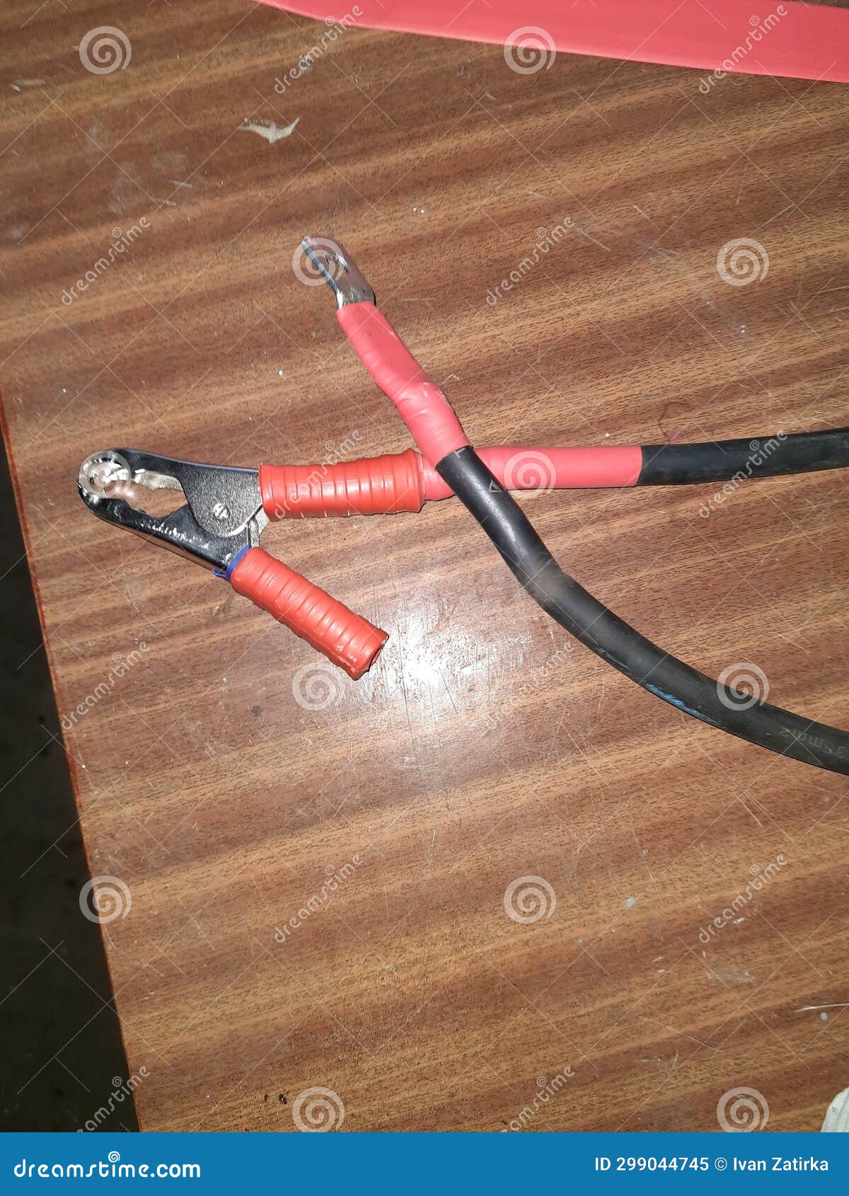 Thick Black Electrical Wire and Red Contacts. Stock Image Image of