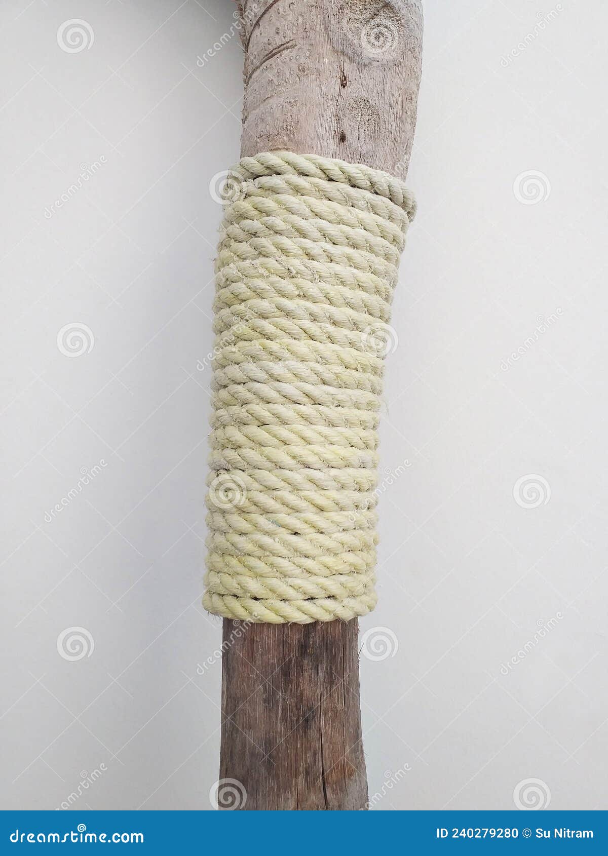 Thick Braided Rope Tied on Wooden Stick on White Background. Skein of Rope  Jute. Rustic Rope Roll. Decoration and Ornate Stock Photo - Image of brown,  knot: 240279280