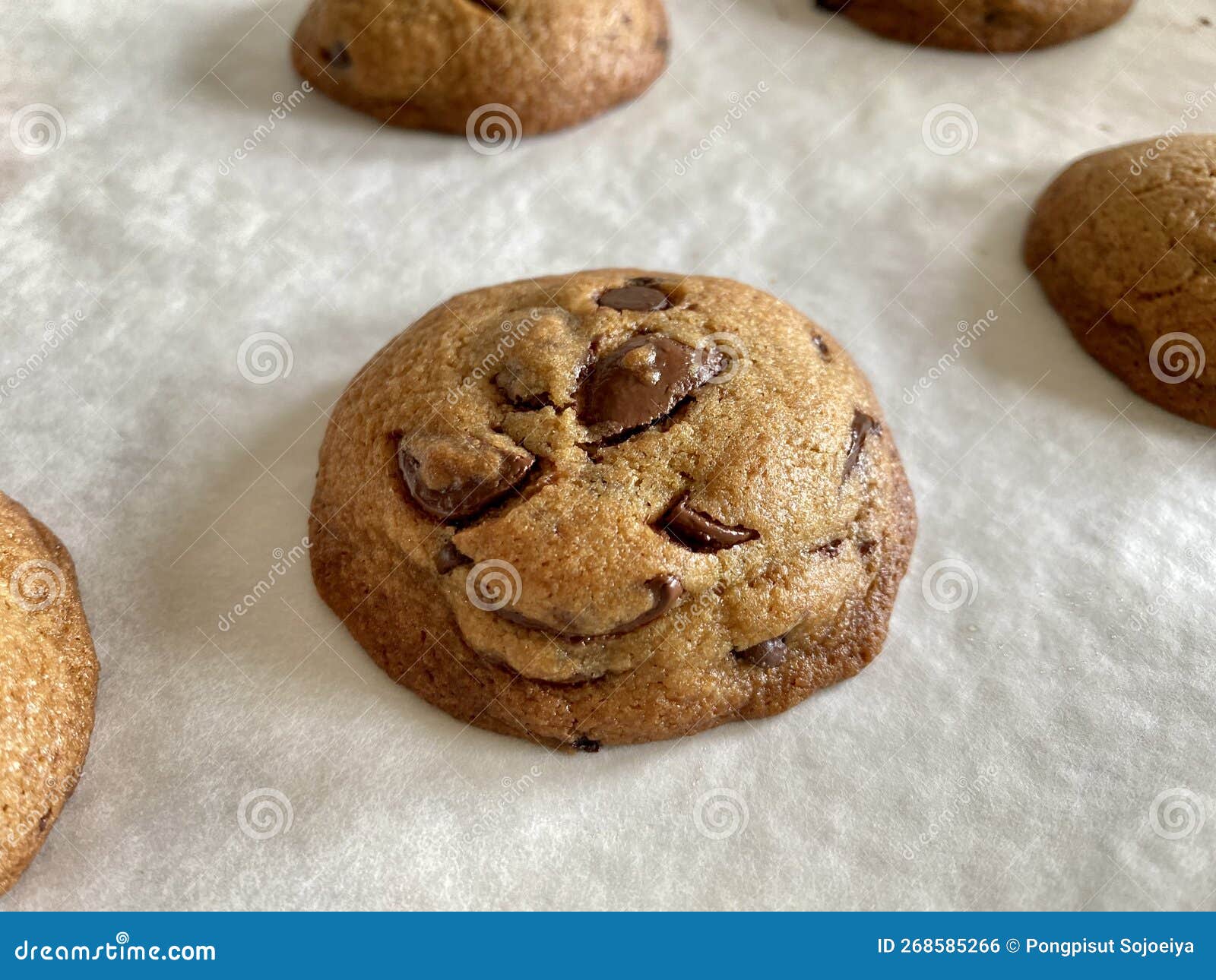 thick chocolate chip cookies on nonstick baking sheet