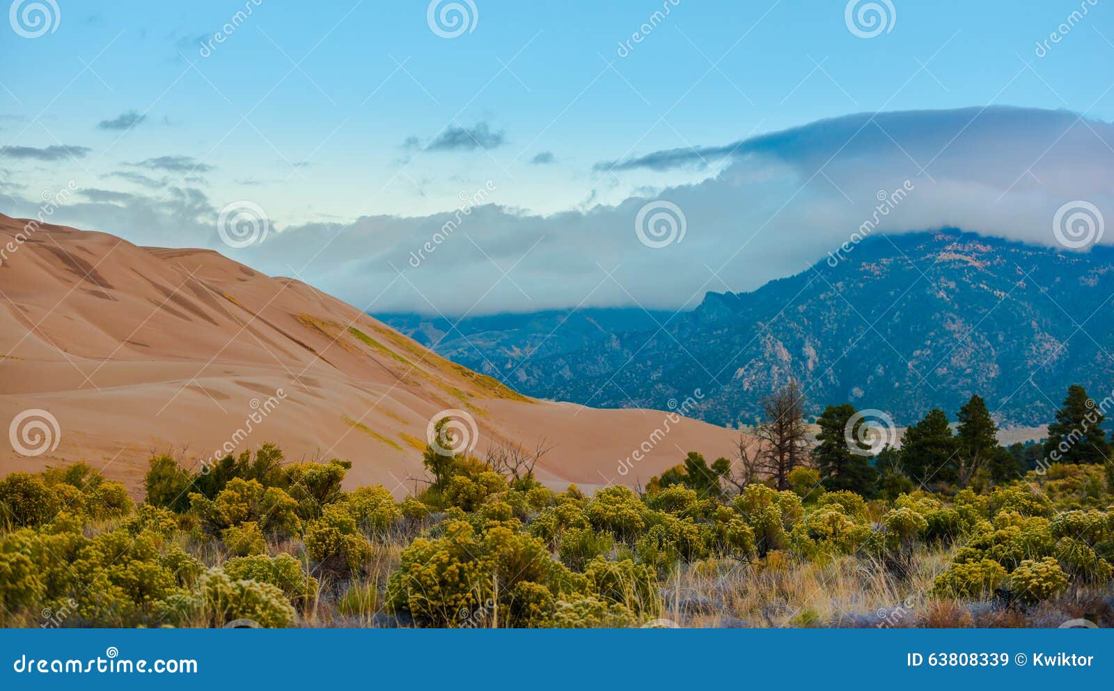 thick clouds over the sangre de cristo mountains great sand dune