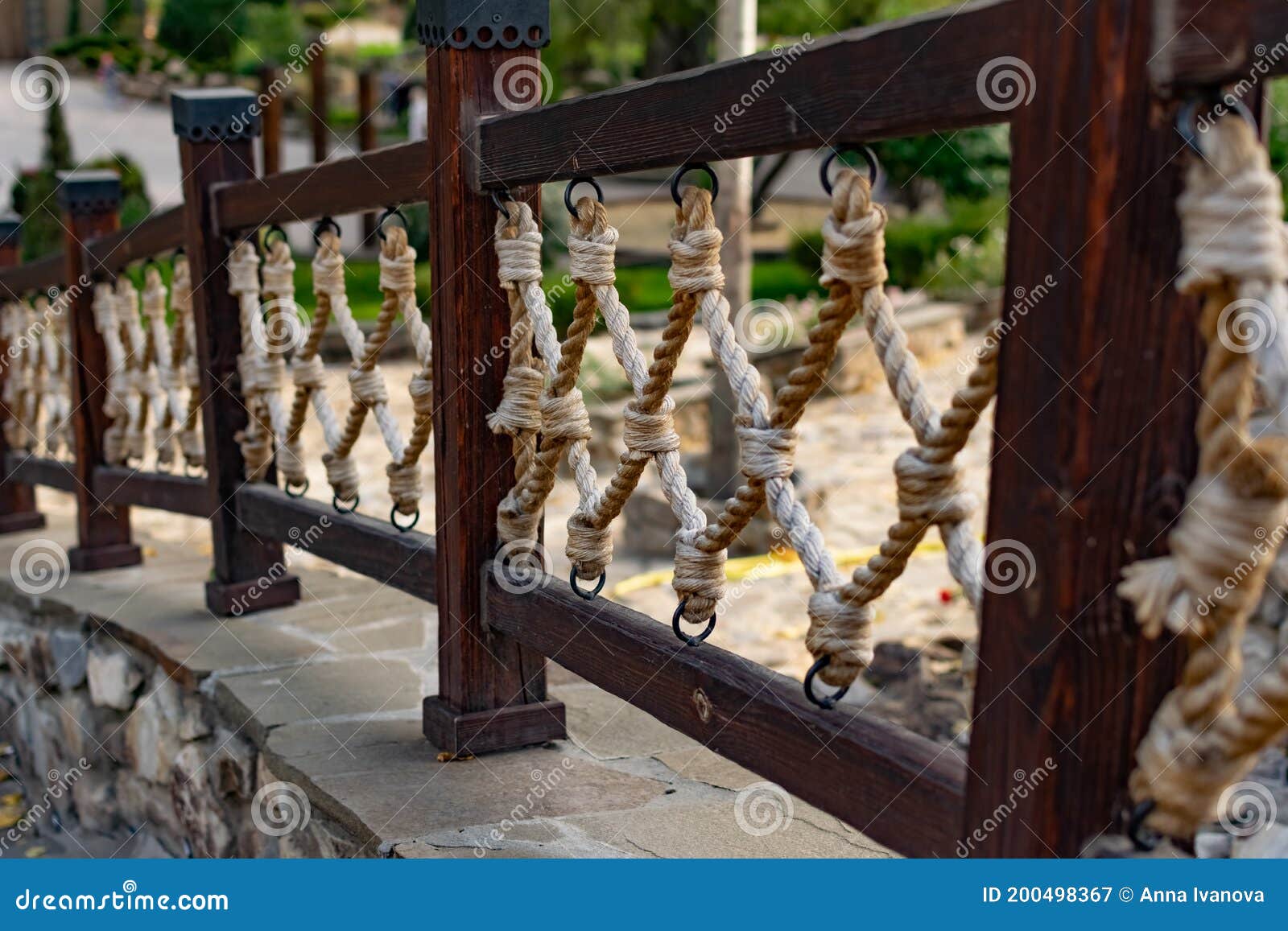 Thick Rope Ropes, Intertwined Crosswise, Hang on Wooden Railings,  Decorative Fence Along the Alley in the Park for Recreation. Stock Image -  Image of metal, fence: 200498367