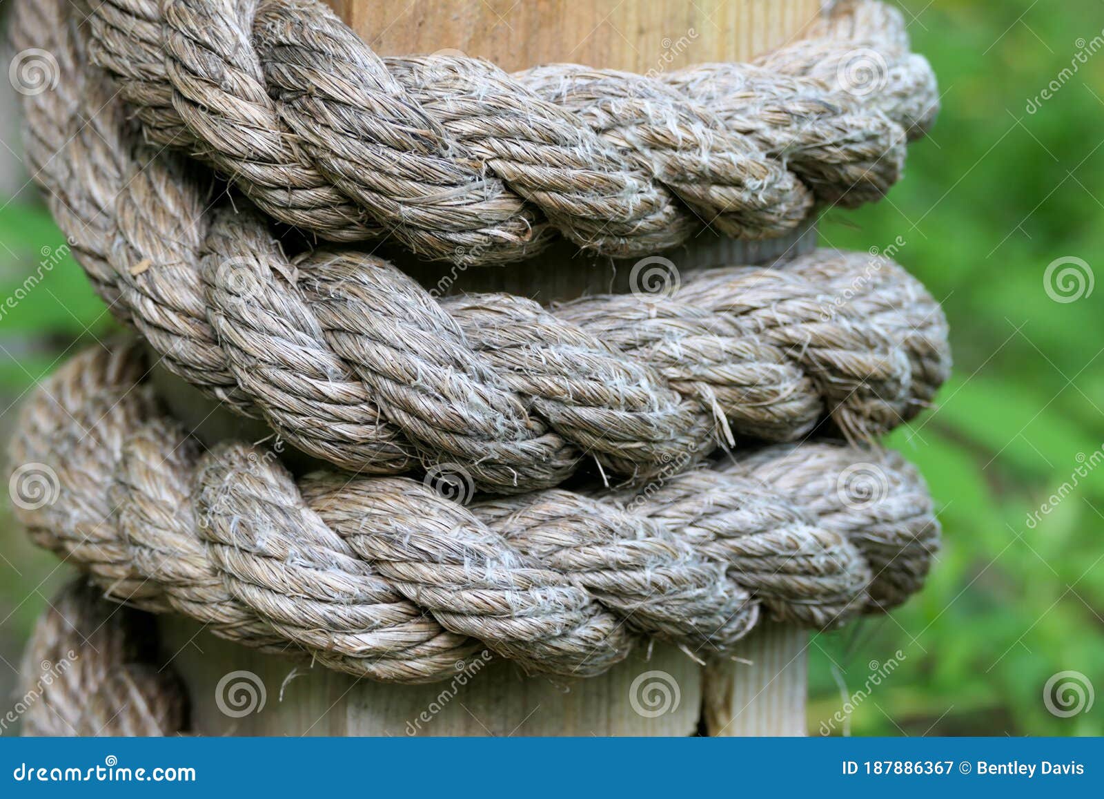 Thick Twine Rope Wrapped Around a Wooden Post Stock Image - Image