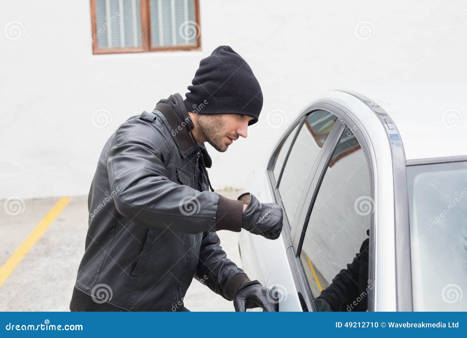 Thief Breaking into Car with Fist Stock Photo Image of burglary