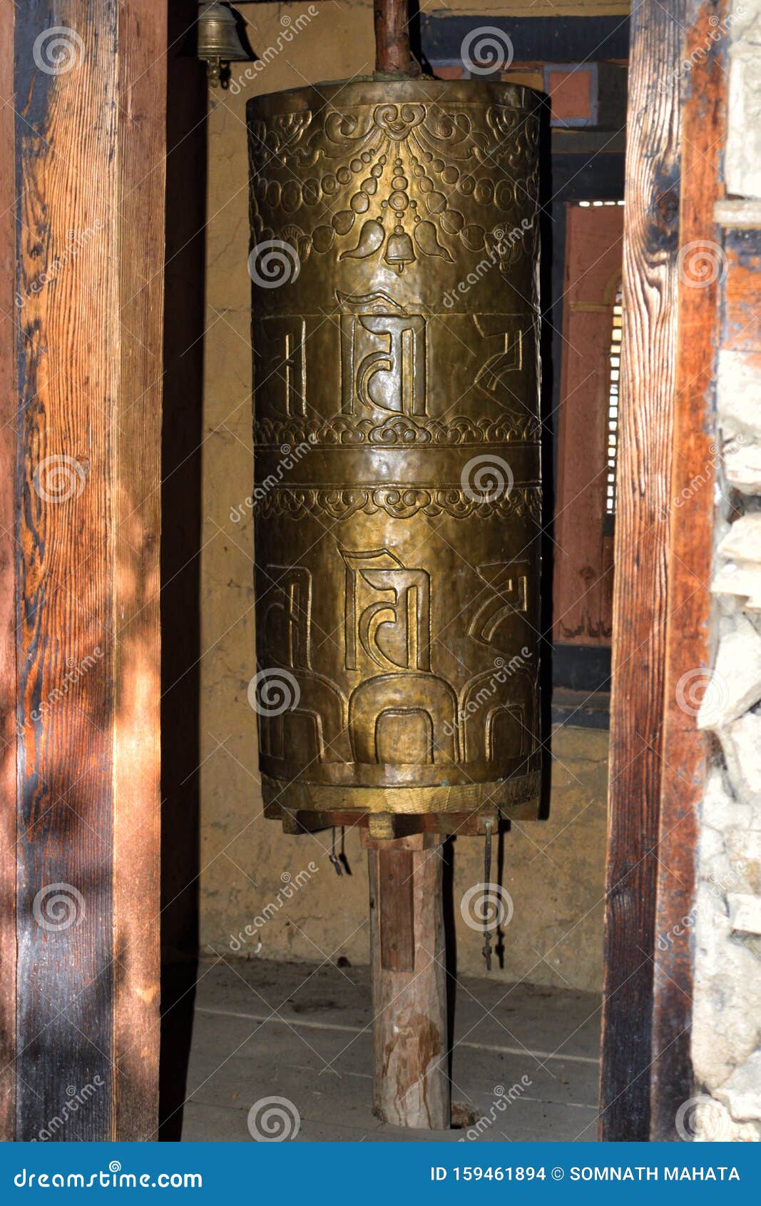 buddhist prayer wheel close-up in a temple